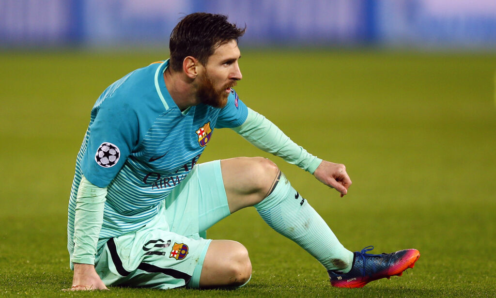 Barcelona's Lionel Messi looks on duringVthe Champion's League round of 16, first leg soccer match between Paris Saint Germain and Barcelona at the Parc des Princes stadium in Paris, Tuesday, Feb. 14, 2017. PSG won the match 4-0. (AP Photo/Francois Mori)