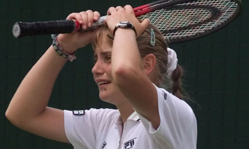 Australia's Jelena Dokic reacts to a missed shot, during her Women's Singles, second round match against Slovakia's Katarina Studenikova, at Wimbledon, Thursday June 24, 1999. Dokic won the match 6-0, 4-6, 8-6.(AP Photo/Adam Butler)