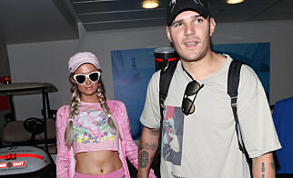 Paris Hilton Sighting - Los Angeles. Paris Hilton and Chris Zylka are seen at LAX Airport in Los Angeles URN:37852354